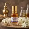 The Divine Fragrance of Fresh Jasmine Blossoms. Experience the enchanting and sweet aroma of fresh Bela (Jasmine) with Haridwar Bliss Premium Attar. This 10ml concentrated perfume oil is specially crafted for spiritual use, ensuring a long-lasting and soothing fragrance that fills your home mandir with positivity. Bela is known for its calming properties and is highly recommended for daily rituals, meditation, and offering to the deities. Why Choose Our Bela Attar? 100% Alcohol-Free: Pure oil-based formulation that is safe for skin and perfect for sacred puja vastra (clothes). Sweet & Soulful Aroma: A natural, floral scent that reduces stress and creates a peaceful environment for dhyana (meditation). Highly Concentrated: Just a single drop on a cotton swab or your puja items is enough to keep the fragrance alive for hours. Premium Quality: Hand-bottled to preserve the natural essence of jasmine flowers. Perfect For: Daily Puja and Aarti rituals. Applying on deities and idols. Anointing puja accessories like the Gangajali or Lota. Personal use as a natural, long-lasting perfume oil.